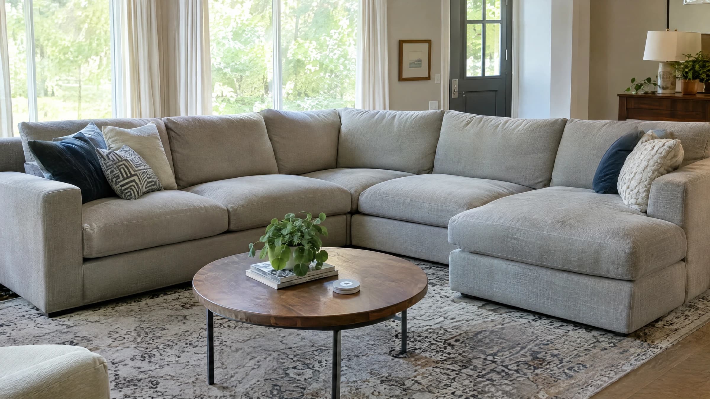 A sectional sofa in an ordinary living room with its connected seating sections visible.